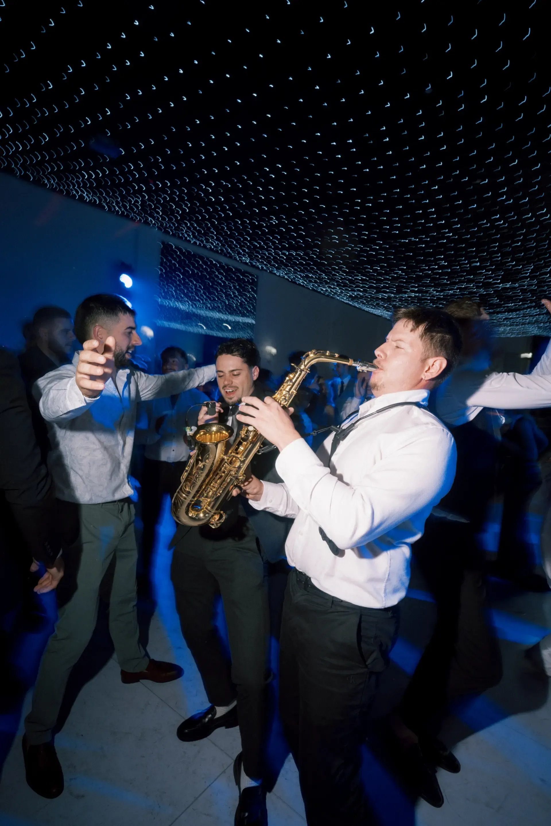 Gus Rodriguez performing saxophone at a live event in South Australia
